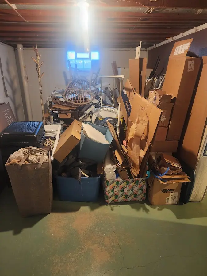 Roll-off dumpster container at job site for 15 Yard Dumpster Rental in Manchester